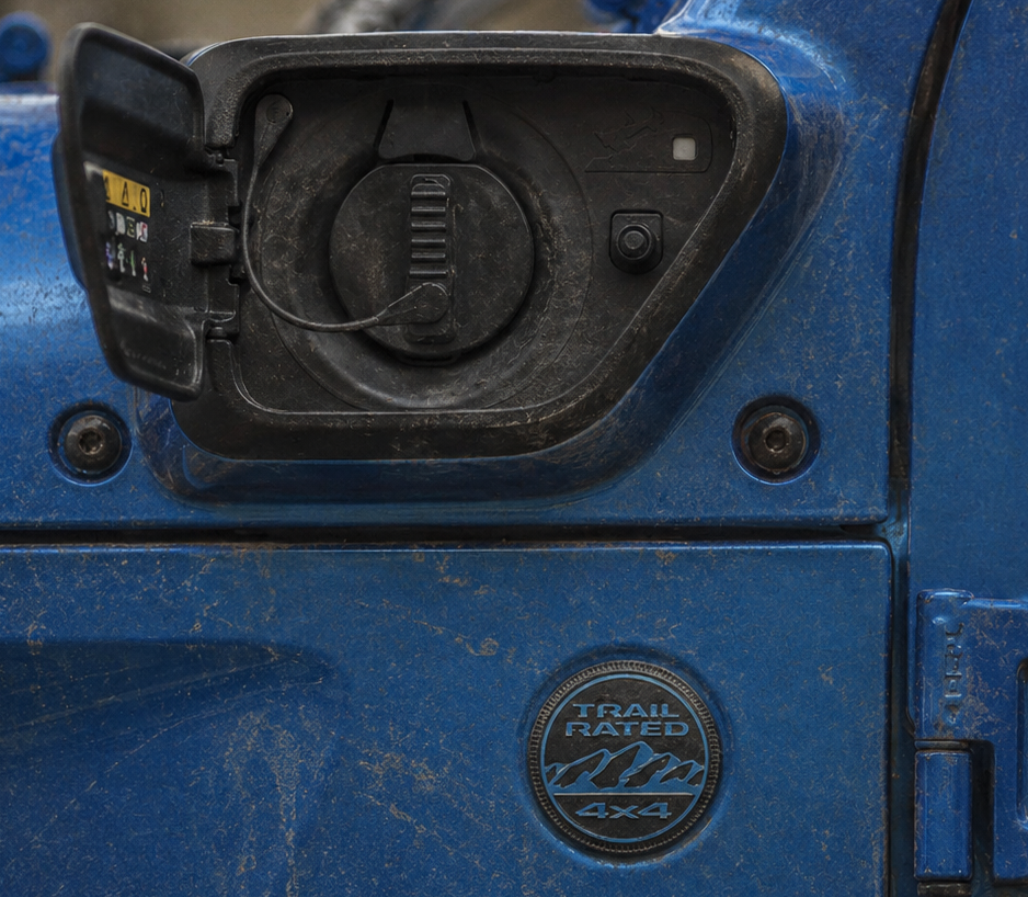 Jeep Wrangler 4xe plug-in hybrid charge port — the electric charging inlet of the 4xe PHEV that owners report losing power from during normal driving.